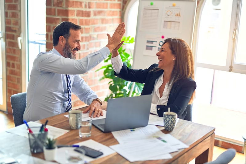 Happy couple receiving good financial news